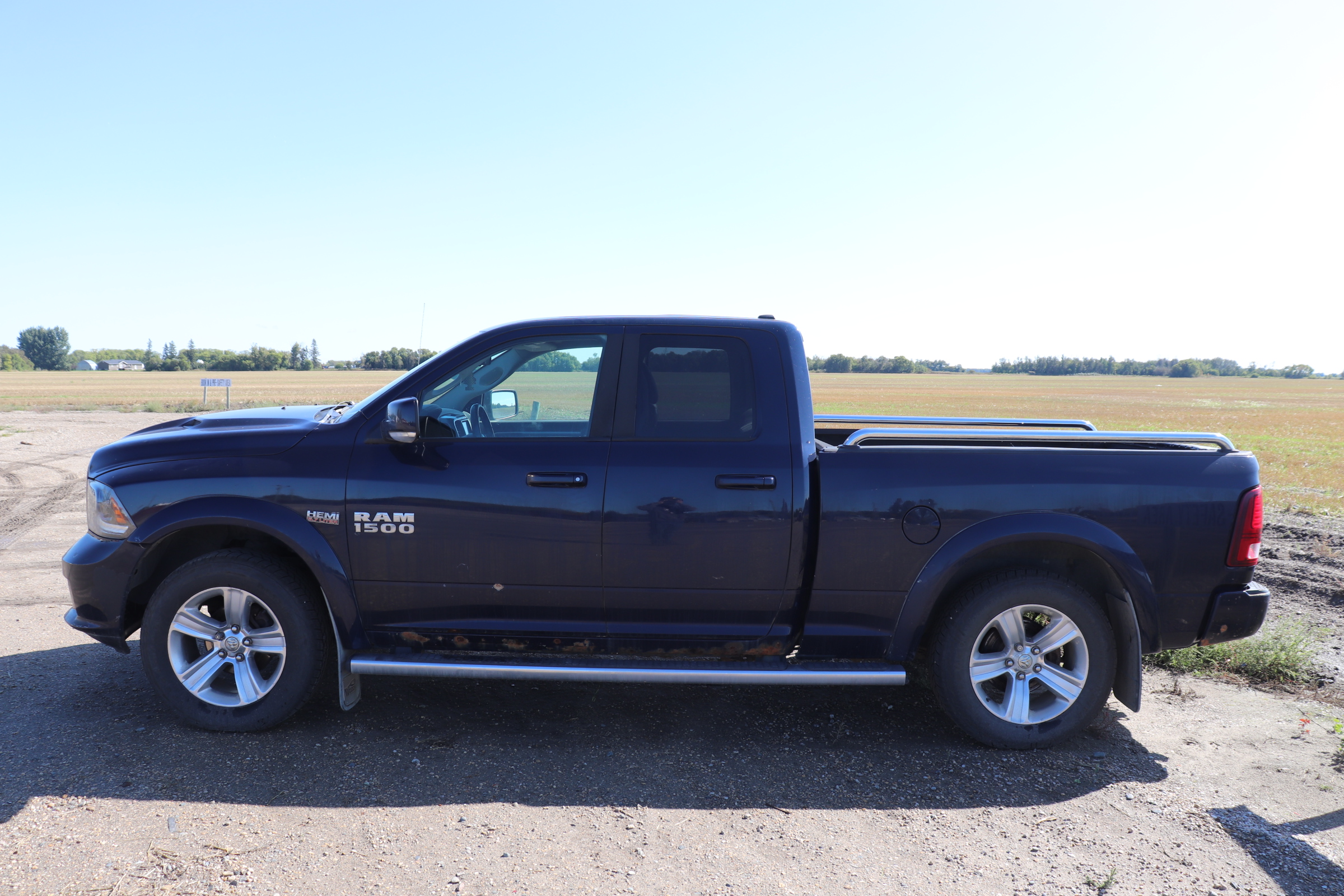 2015 RAM 1500 (R)(K)(5) Sport Quad Cab 4WD - 5