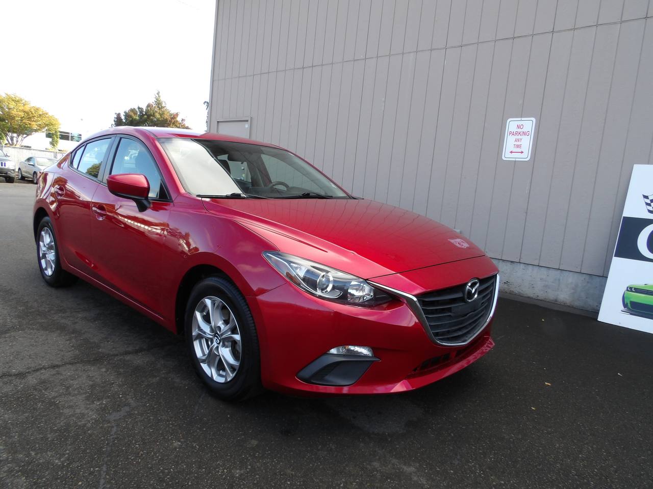 Red 2015 Mazda MAZDA3 Sedan Front-Wheel Drive Automatic