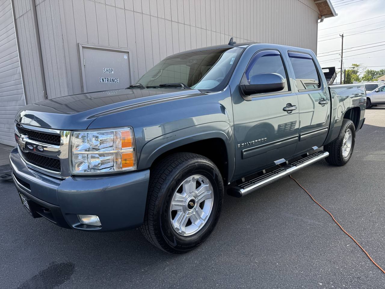 Blue 2009 Chevrolet Silverado 1500 Pickup Truck Four-Wheel Drive Automatic