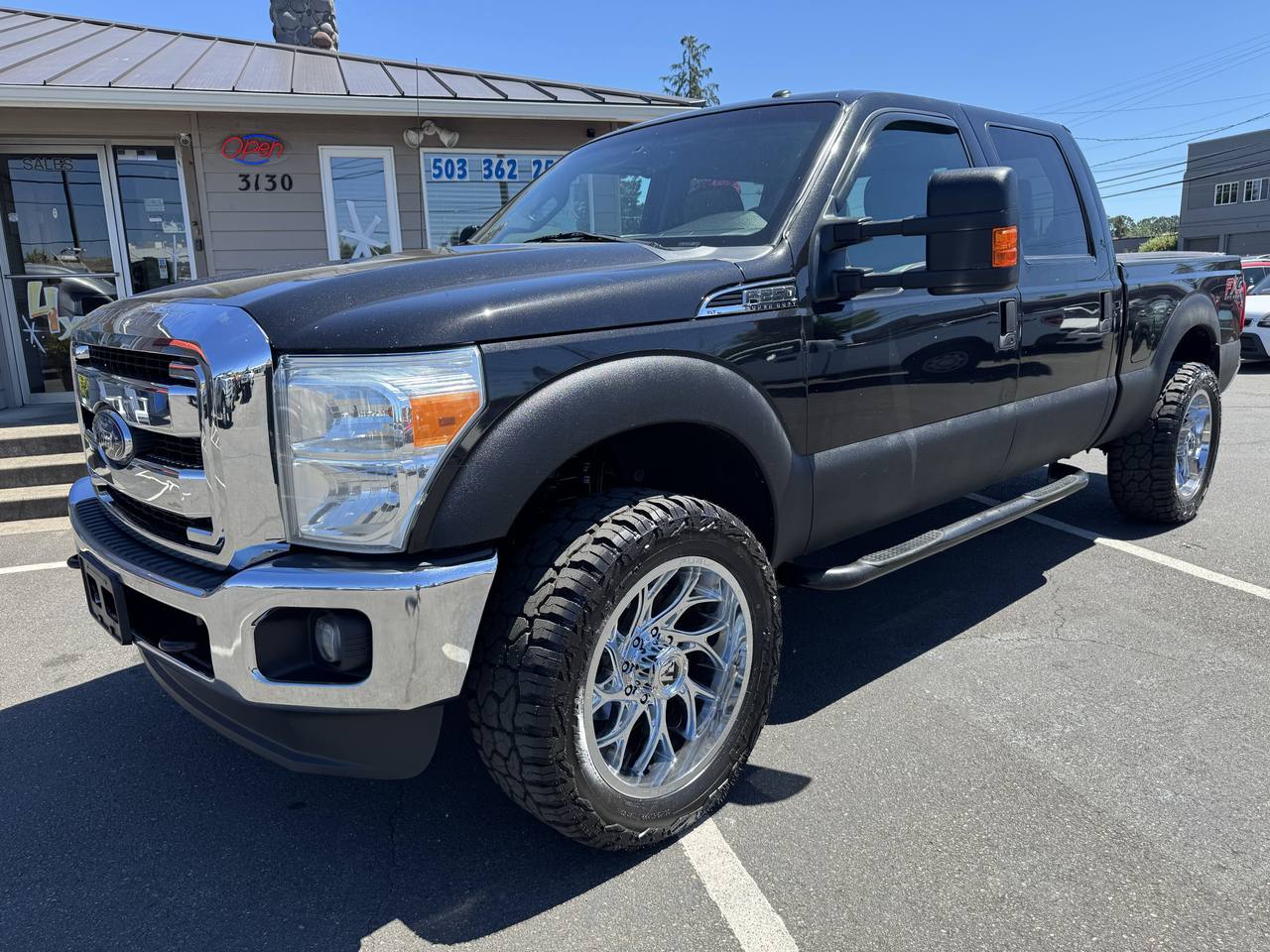 Black 2015 Ford F-250 Super Duty Pickup Truck Four-Wheel Drive Automatic