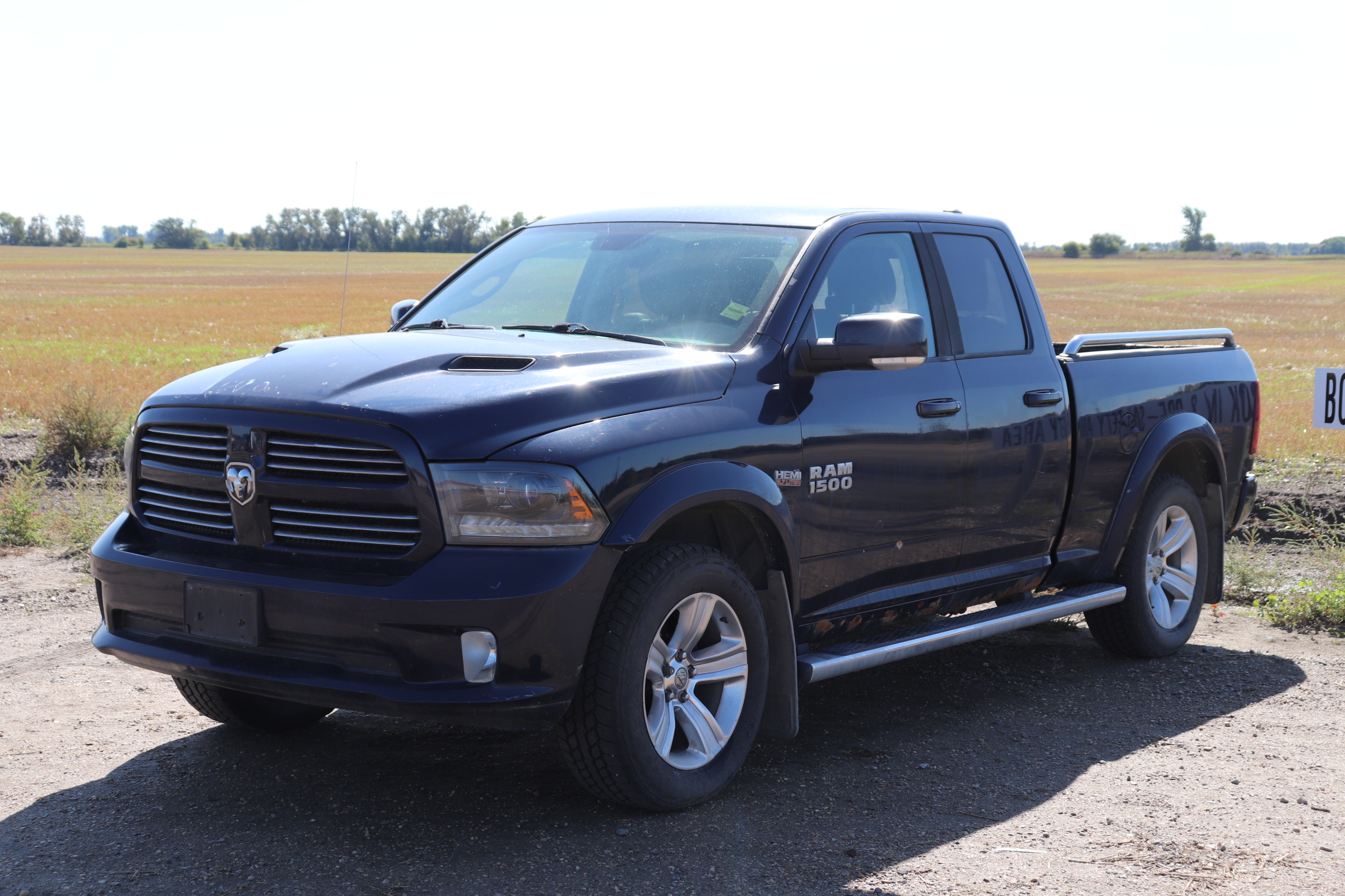 2015 RAM 1500 (R)(K)(5) Sport Quad Cab 4WD